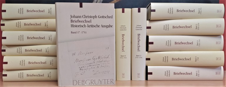 A bookshelf with all the volumes published by 2024.